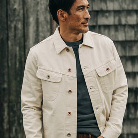 fit model wearing The Long Haul Jacket in Natural Organic Selvage, looking right