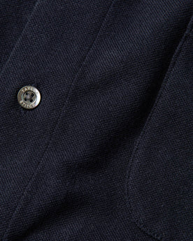 material shot of button, Knits by Taylor Stitch