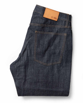 folded flatlay of jean back, Bottoms by Taylor Stitch