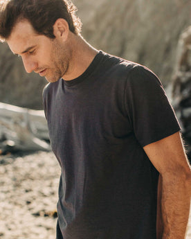 our fit model wearing The Standard Issue Tee in Charcoal Hemp—cropped shot head down, Knits by Taylor Stitch