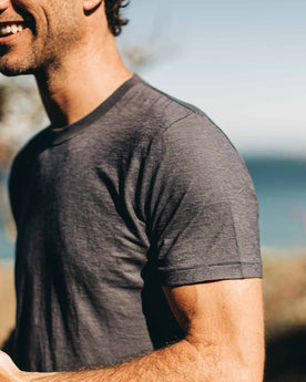our fit model wearing The Standard Issue Tee in Navy Hemp—cropped shot of shoulder, Knits by Taylor Stitch