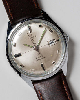 material shot of the watchface on The 1970 Timex 21, Accessories by Taylor Stitch