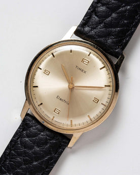 material shot of the watchface of The 1965 Timex Electric, Accessories by Taylor Stitch