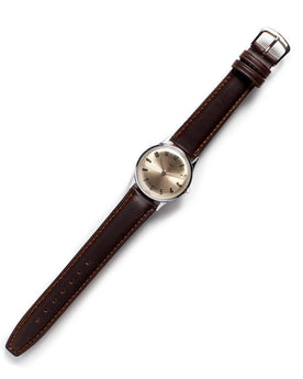 flatlay of The 1968 Timex Mercury, Accessories by Taylor Stitch