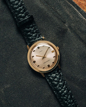 editorial image of The 1972 Timex Marlin Gold, Accessories by Taylor Stitch