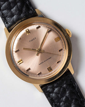 material shot of the watchface on The 1972 Timex Marlin Gold, Accessories by Taylor Stitch