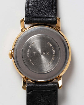 material shot of the back of The 1974 Timex Mercury Calendar Gold, Accessories by Taylor Stitch