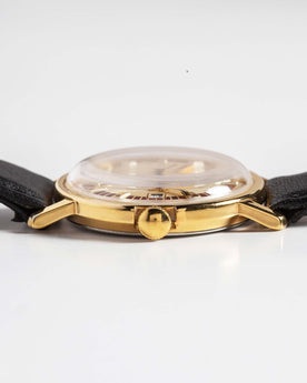 material shot of the side of The 1974 Timex Mercury Calendar Gold, Accessories by Taylor Stitch