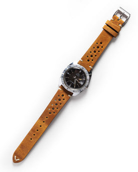 flatlay of the 1976 Timex Electric Dynabeat, Accessories by Taylor Stitch