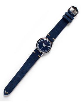 flatlay of the 1976 Timex Mercury Blue, Accessories by Taylor Stitch