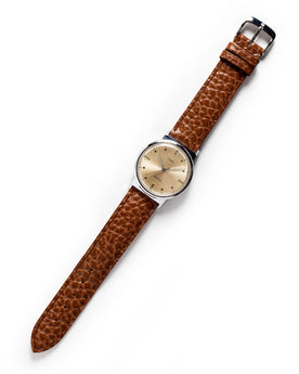 flatlay of The 1964 Timex Electric, Accessories by Taylor Stitch