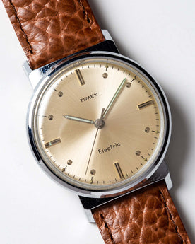 material shot of the watchface of The 1964 Timex Electric, Accessories by Taylor Stitch
