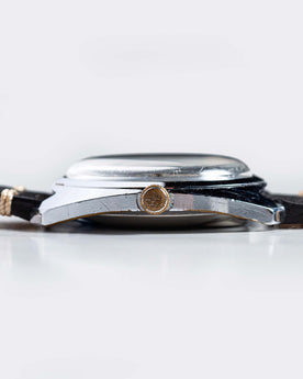 flatlay of 1975 Timex Electric Dynabeat "Rotary", from the side, Accessories by Taylor Stitch