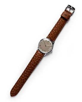 flatlay of The 1966 Timex Mercury, Accessories by Taylor Stitch