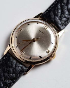 material shot of the watchface of The 1970 Timex Mercury "MLK", Accessories by Taylor Stitch