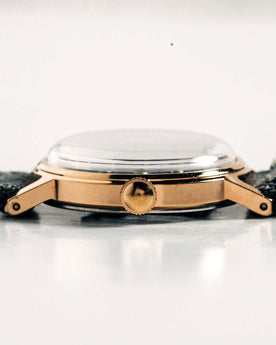 flatlay of the 1978 Timex Mercury "Denim", shown from the side, Accessories by Taylor Stitch