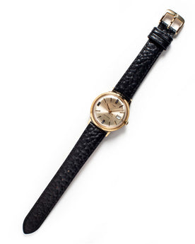 Flat lay of Timex 1970 Viscount, Accessories by Taylor Stitch