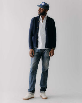 fit model rocking the The Crawford Sweater in Navy in a car, Knits by Taylor Stitch