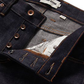 material shot of the button fly on The Democratic Jean in Kuroki Welterweight Slub