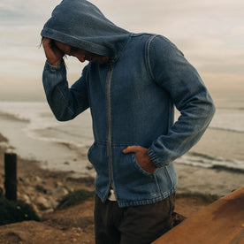 fit model wearing The Riptide Jacket in Washed Indigo Twill by the sea