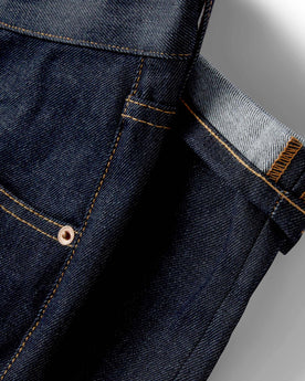 material shot of the pocket and cuff detailing on The Slim Jean in Cone Mills Cordura Denim, Bottoms by Taylor Stitch