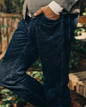 The Camp Pant in Indigo Corduroy—walking left of screen, Bottoms by Taylor Stitch