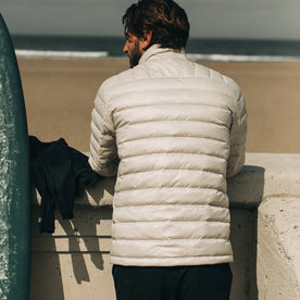 our fit model wearing The Taylor Stitch x Mission Workshop Farallon Jacket in fog—back shot