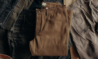 editorial image of various Good Acre pants