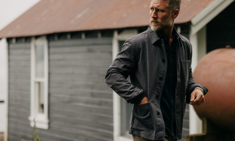 fit model walking wearing The Ojai Jacket in Organic Charcoal Foundation Twill