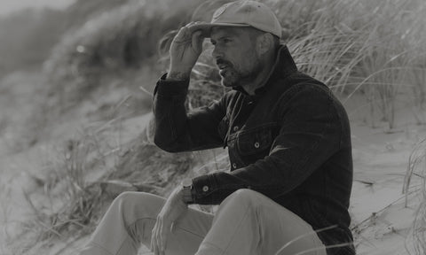 fit model posing in The Long Haul Jacket in Rinsed Indigo Waffle