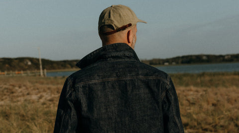 fit model walking wearing the Long Haul Jacket in Rinsed Organic Selvedge