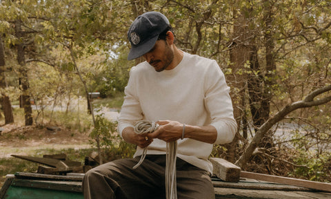 fit model posing in The Lodge Sweater