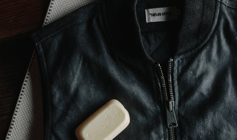 Waxed Jacket shown with a bar of wax