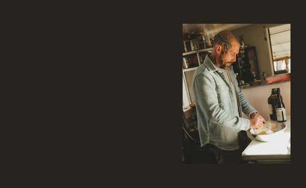 Chef Scott Clark cooking in The Division Shirt