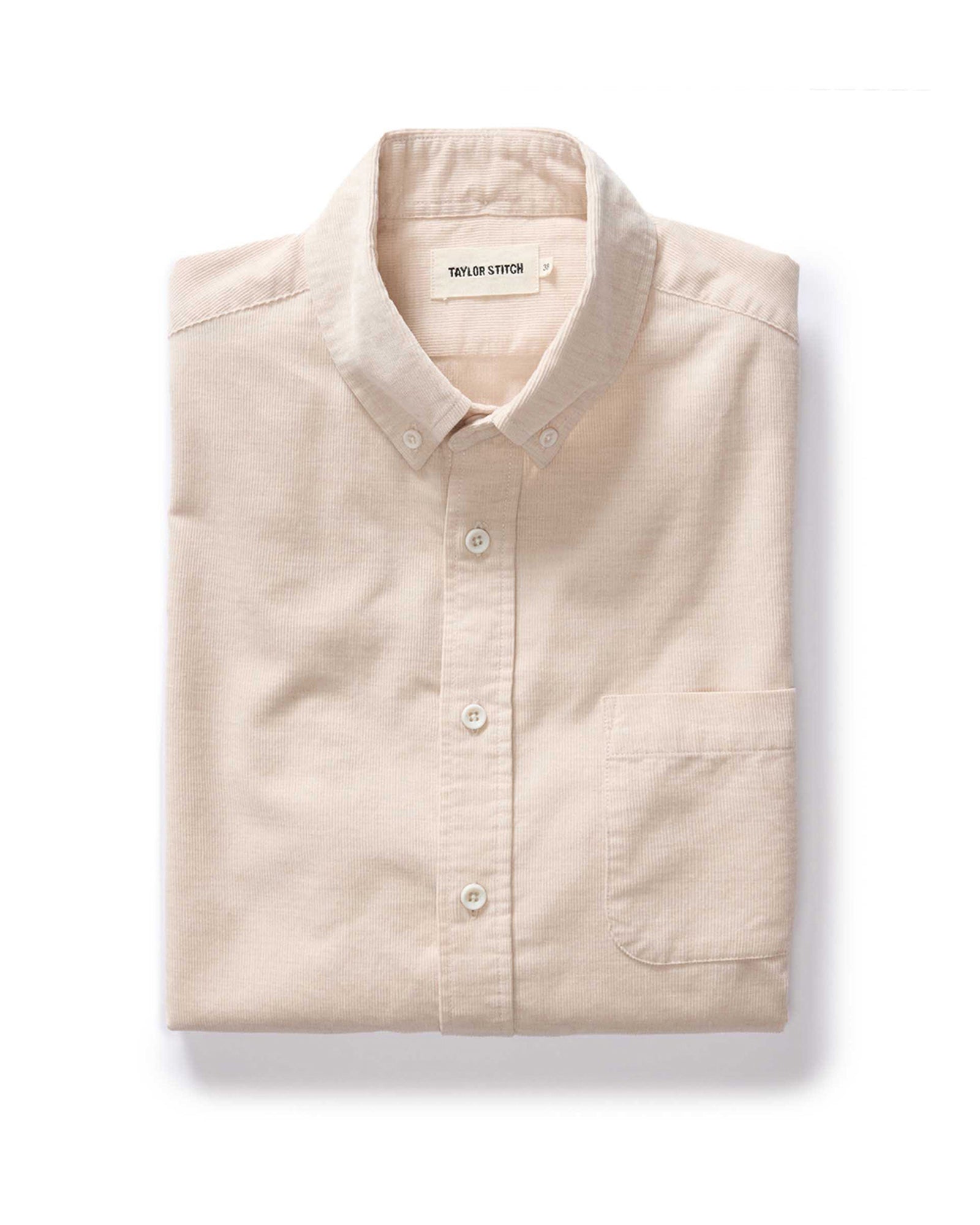 folded flatlay of The Jack in Oat Heathered Pincord, Wovens by Taylor Stitch