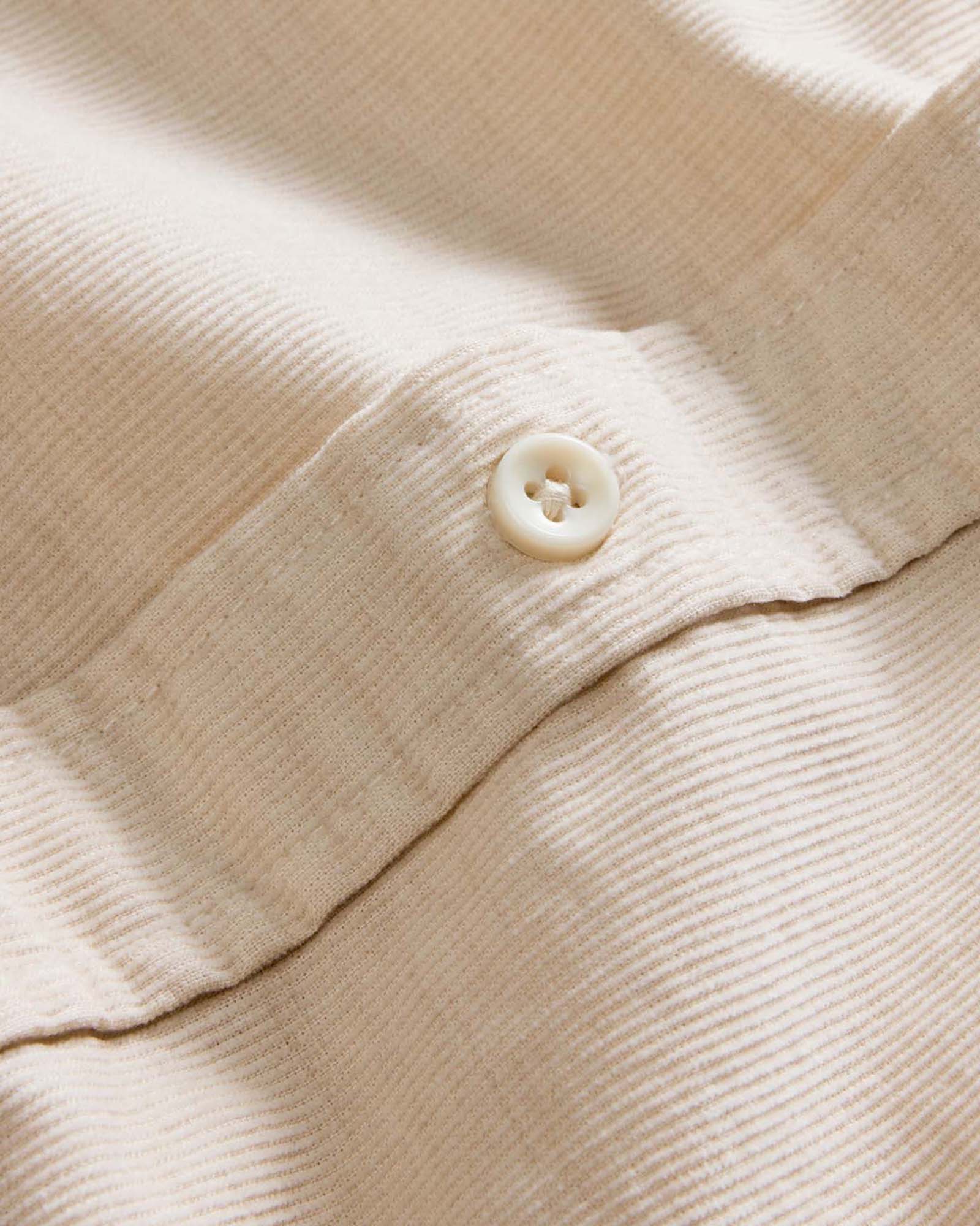 material shot of the back collar on The Jack in Oat Heathered Pincord, Wovens by Taylor Stitch