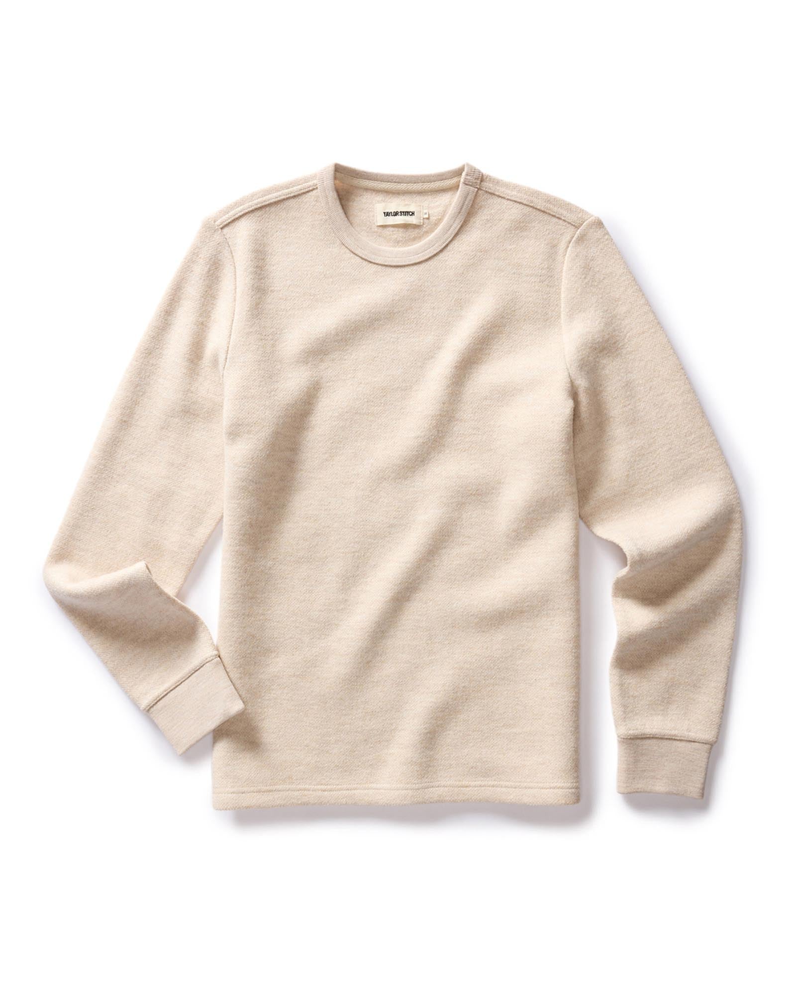 flatlay of The Evans Crew in Oat Birdseye Wool, Knits by Taylor Stitch