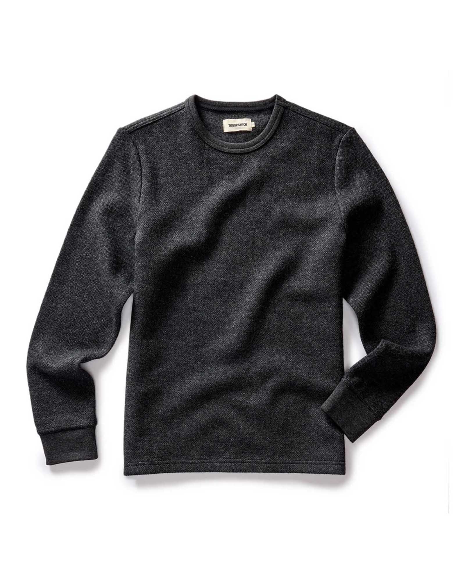 flatlay of The Evans Crew in Charcoal Birdseye Wool, Knits by Taylor Stitch