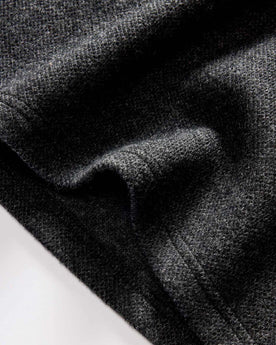 material shot of the hem on The Evans Crew in Charcoal Birdseye Wool, Knits by Taylor Stitch