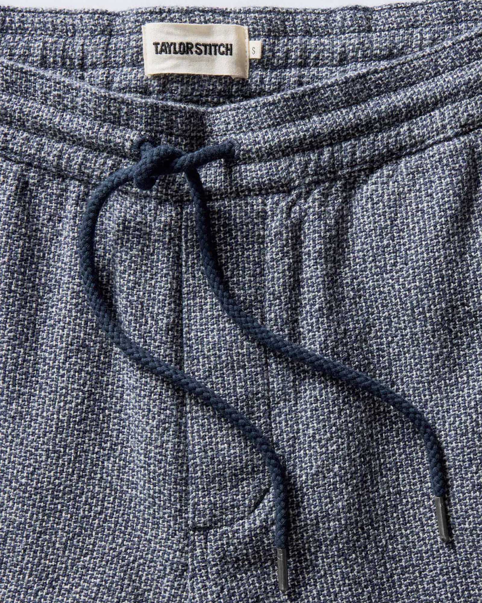 folded flatlay of The Apres Pant in Navy Linen Tweed, from the back, Bottoms by Taylor Stitch