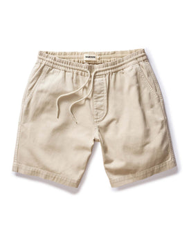 flatlay of The Apres Short in Organic Aged Stone Foundation Twill, Bottoms by Taylor Stitch
