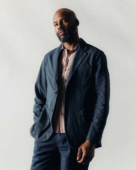 fit model posing wearing The Foundation Sportcoat in Organic Navy Twill, Outerwear by Taylor Stitch
