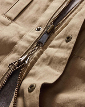 material shot of the two-way zipper on The Pathfinder Jacket in Khaki Dry Wax, Outerwear by Taylor Stitch