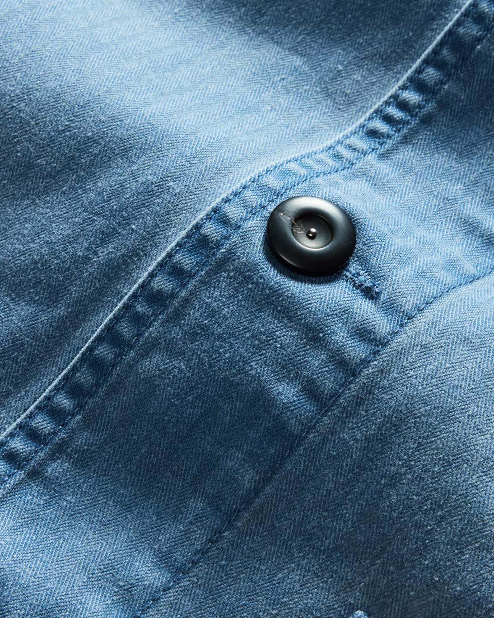 material shot of the buttons on The Ojai Jacket in French Blue Herringbone, Outerwear by Taylor Stitch