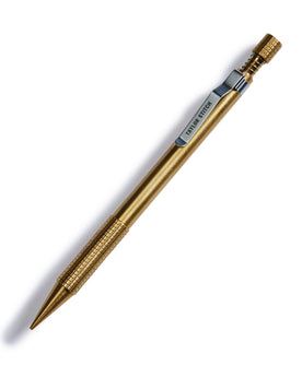 flatlay of The Mechanical Pencil in Brass, Accessories by Taylor Stitch