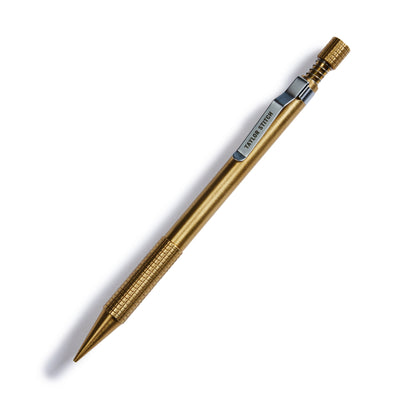 flatlay of The Mechanical Pencil in Brass