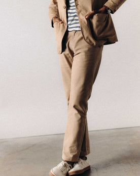 fit model posing in The Democratic Foundation Pant in Organic Khaki, Bottoms by Taylor Stitch
