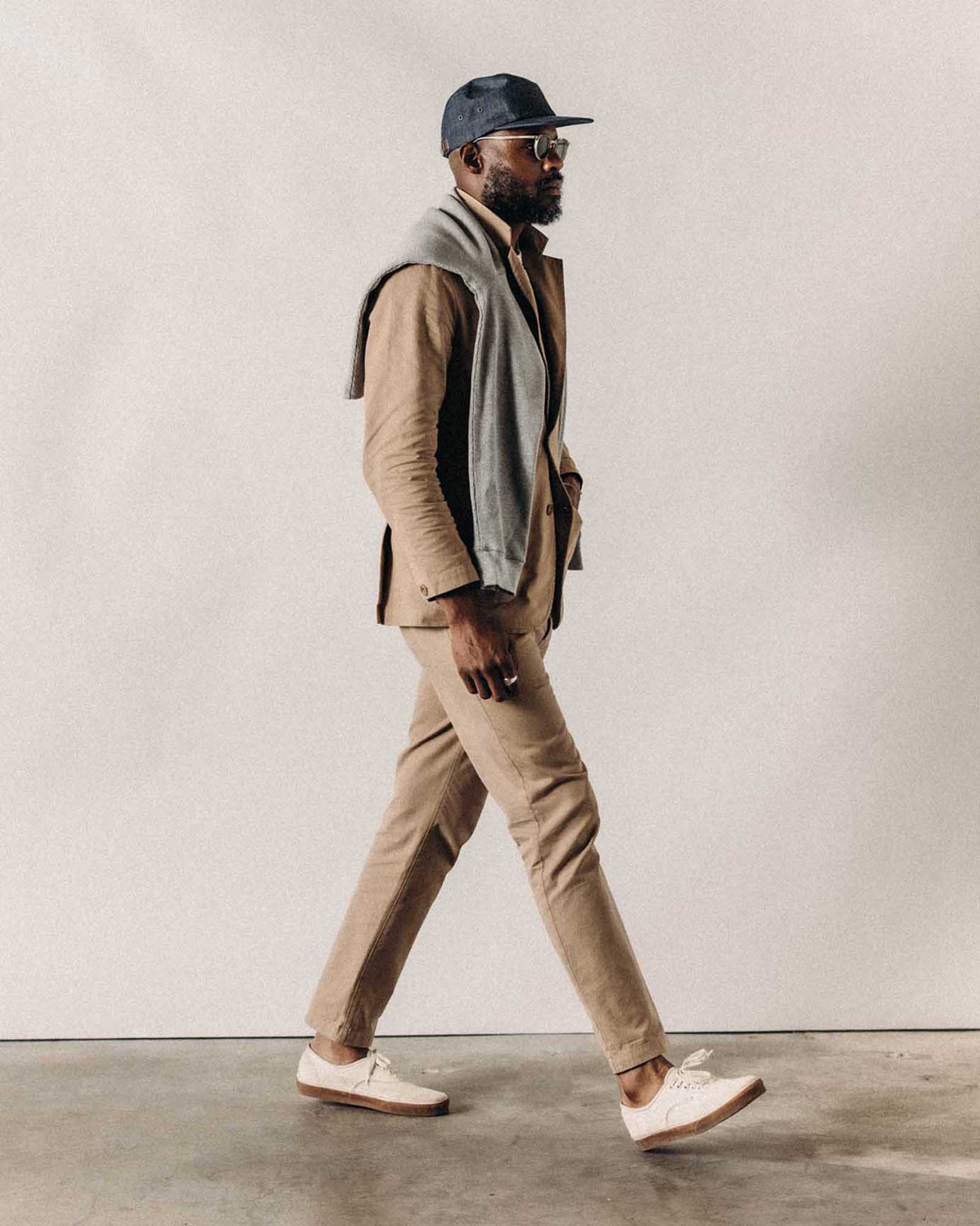 fit model standing wearing The Democratic Foundation Pant in Organic Khaki, Bottoms by Taylor Stitch