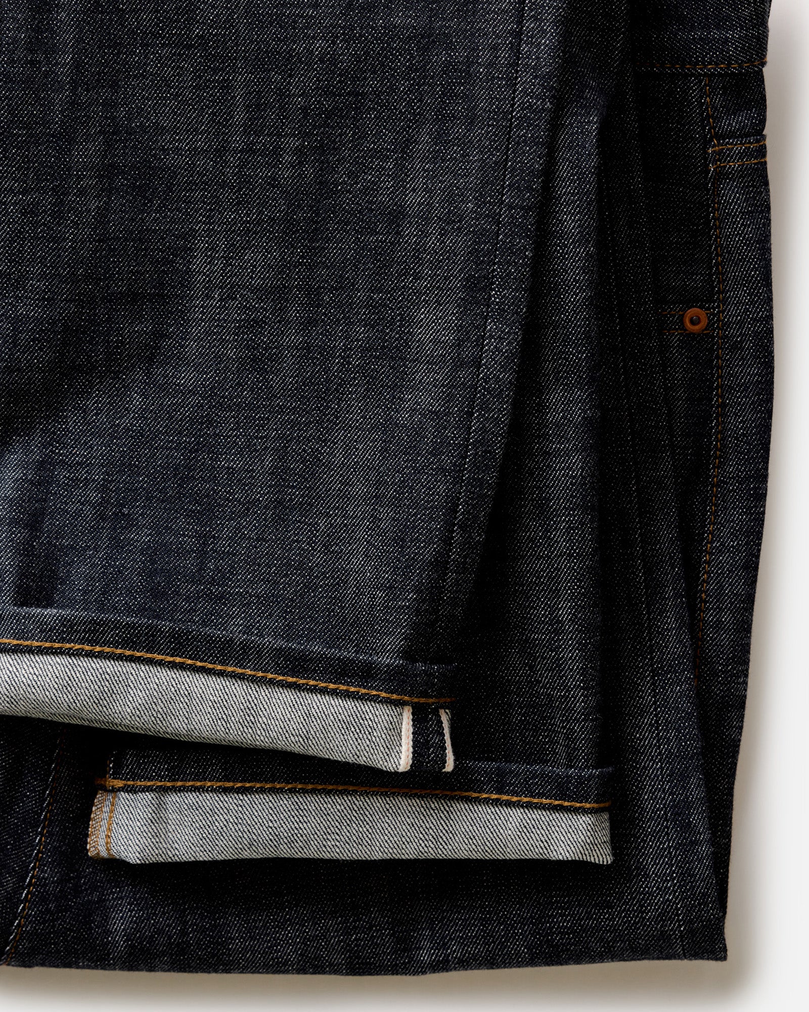 material shot of the selvedge detail on The Democratic Jean in Rigid Organic Selvedge, Bottoms by Taylor Stitch