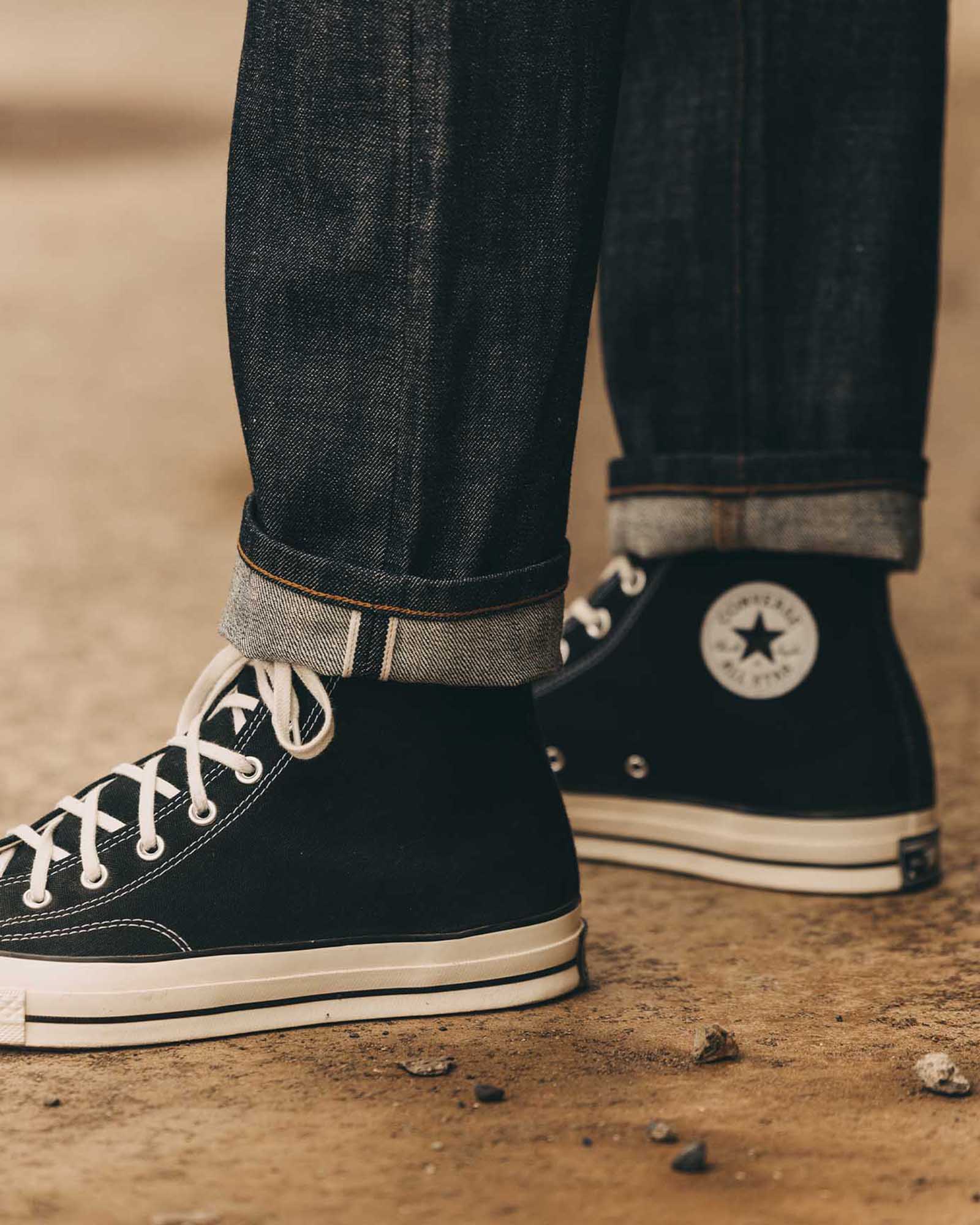 fit model showing off the selvedge cuff on The Democratic Jean in Rigi Organic Selvedge, Bottoms by Taylor Stitch